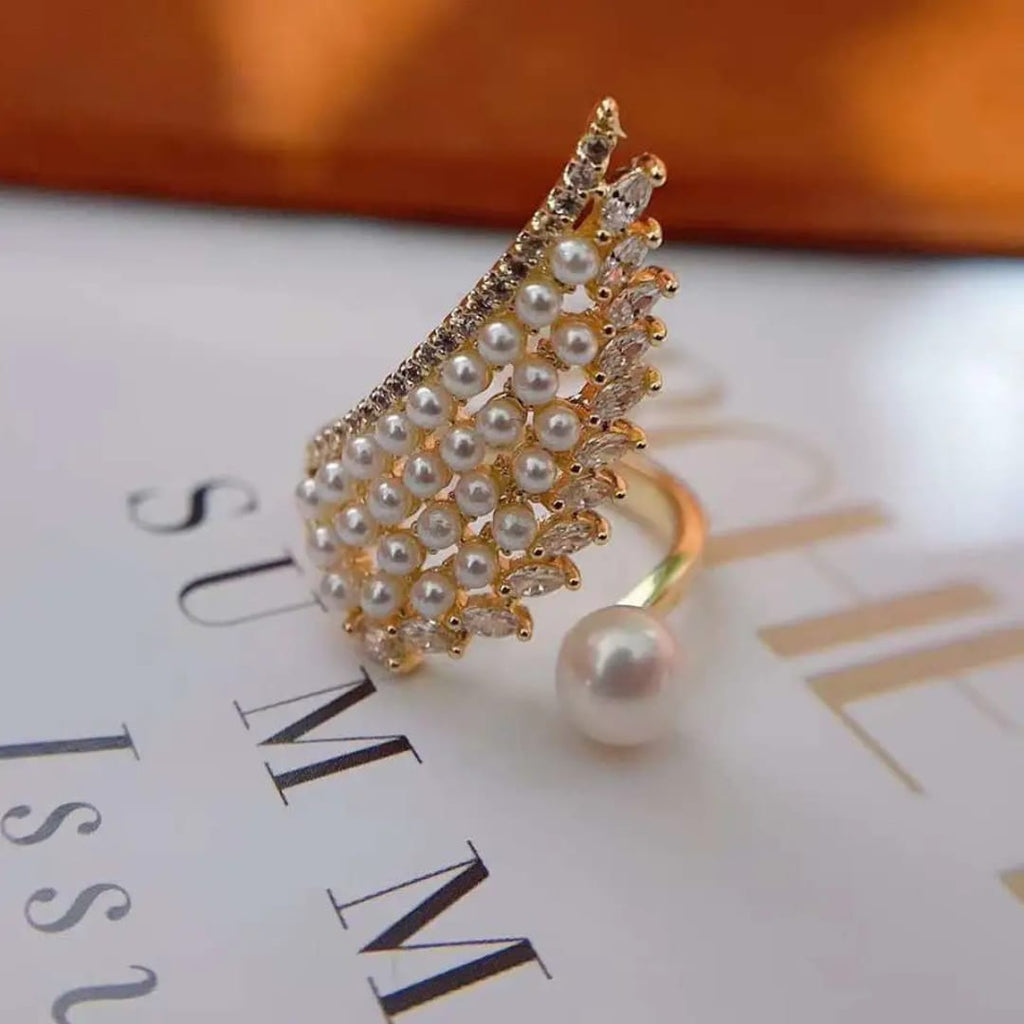 The Pearlescent Angel Wing Statement Ring