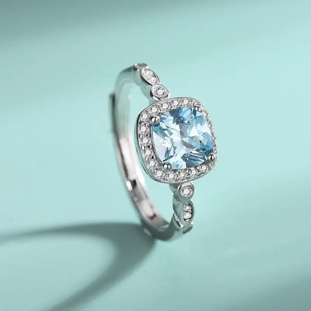 The Ice-Blue Cushion Halo Jewelry Set