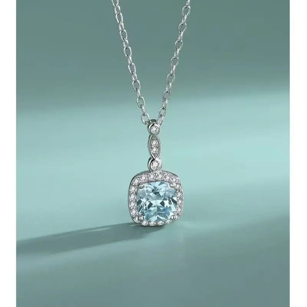 The Ice-Blue Cushion Halo Jewelry Set